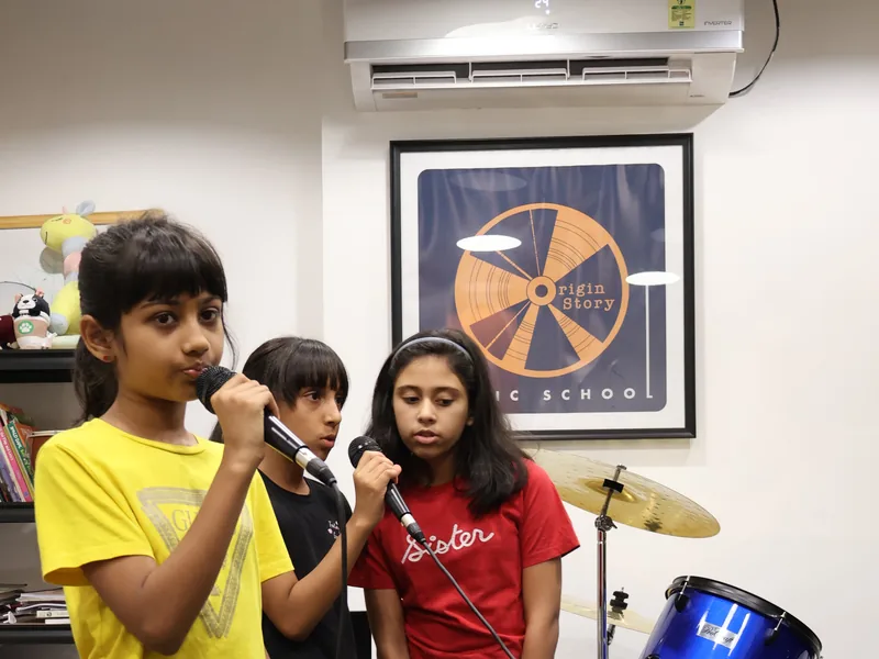 Young singers in the studio, Origin Story
